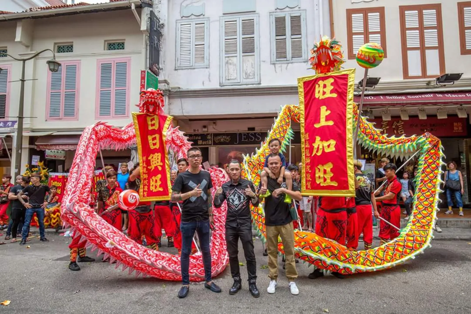 Dragon dance performance with prosperity banners in Singapore
