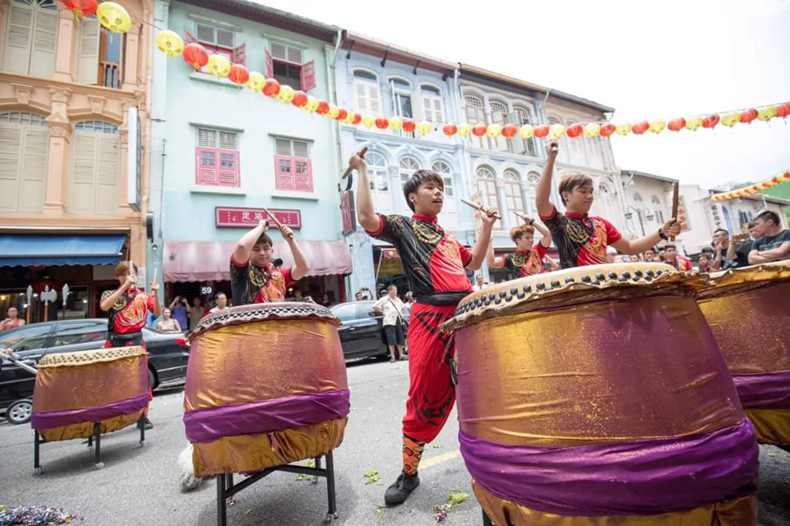 Our drum and percussion team performing at a lion dance show in Singapore