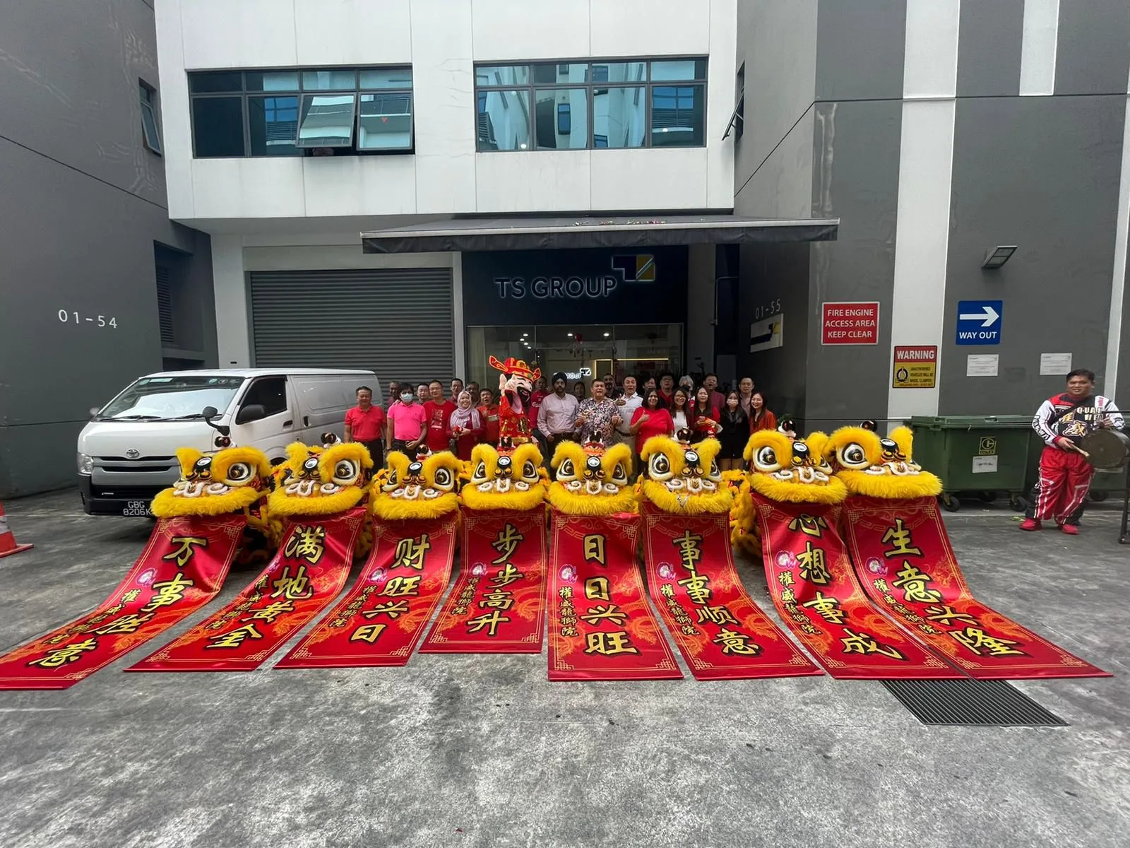 Lions lined up on the red carpet at a grand opening ceremony in Singapore
